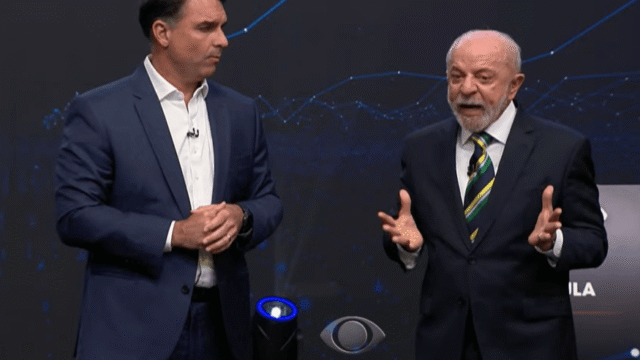 DEBATE: Lula cobra Flávio sobre Covid e filho de Bolsonaro admite falha, mas cita “pandemia de assassinatos”