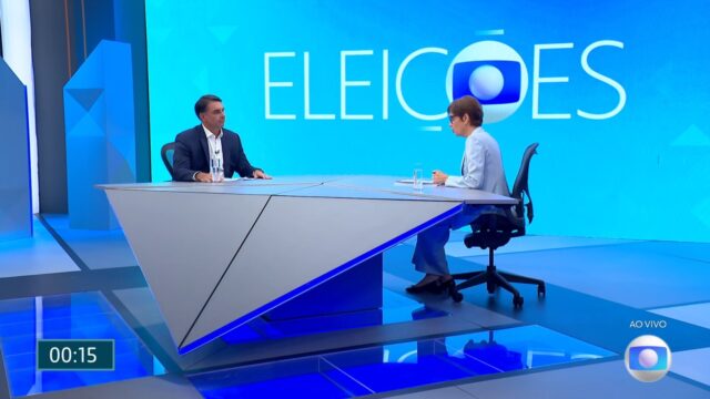 Flávio Bolsonaro cita Banco Master e Domingão em entrevista ao vivo na Globo e é rebatido por Renata Lo Prete