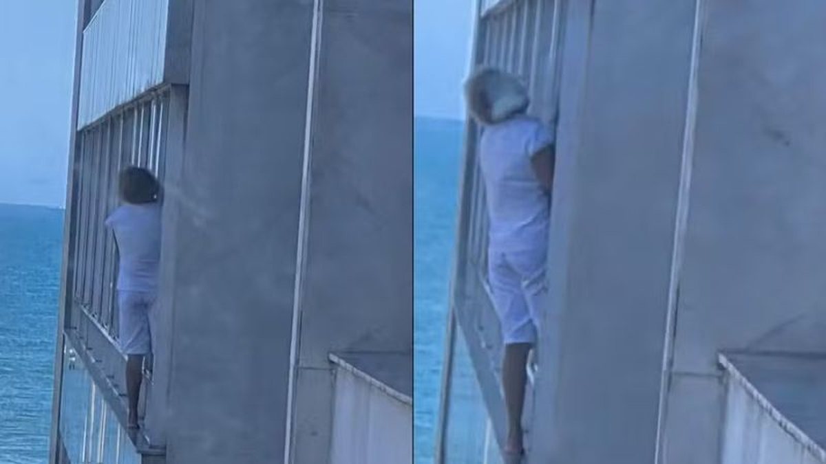 RISCO: doméstica é flagrada se equilibrando em parapeito para limpar janela de apartamento no Leblon